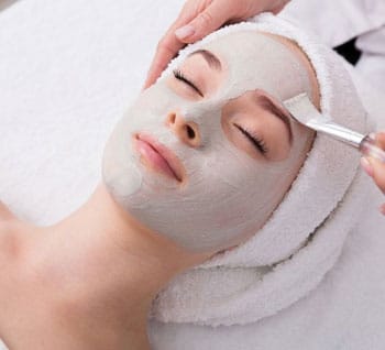Salon Suites Esthetician Giving Face Mask